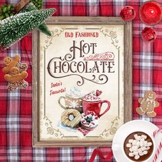 an old fashioned hot chocolate sign surrounded by christmas decorations and cookies on a red plaid tablecloth