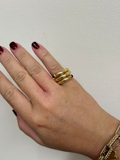 Tiffany & Co Schlumberger 18k gold wrap ring with two rubies. DESIGNER: Tiffany & Co MATERIAL: 18k Yellow Gold GEMSTONES: Ruby DIMENSIONS: Ring size 4.75, top is 14mm wide. MARKED/TESTED: Tiffany & Co, 18k, Schlumberger. WEIGHT: 22 grams CONDITION: Previously Owned / Excellent Condition Gold Open Sapphire Ring With Polished Finish, Modern Gold Ruby Ring With Polished Finish, Modern Gold Ruby Ring, Modern Gold Ruby Ring For Anniversary, Gold Open Ruby Ring In 14k, Gold Open Ruby Ring, Gold Ruby Open Ring, 14k Gold Ruby Open Ring, Gold Ruby Ring With Open Design