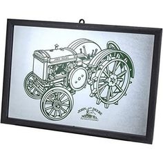 a framed drawing of a tractor with wheels on it's front and back sides