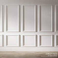 an empty room with white paneled walls and wood flooring is shown in this image