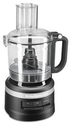 a kitchen aid food processor on a white background