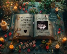 an open book surrounded by candles, flowers and other items on a table with the title once upon at time a new fairy tale begins