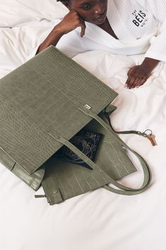 Meet the Large Work Tote in Olive Croc! Invest in a bag that's built to last with our oversized work tote, crafted from high-quality vegan leather and featuring sleek, rolled edges. The magnetic closures and sturdy construction ensure that your belongings will be secure and protected, no matter where your day takes you. Whether you're commuting to the office or traveling for business, this large laptop work tote is designed to withstand the demands of daily use. Office Bags For Women To Work, Designer Work Bag, Office Bags For Women, Work Bags For Women, Tote Bag For Work, Leather Work Tote, Leather Laptop Tote, Best Work Bag, Business And Pleasure