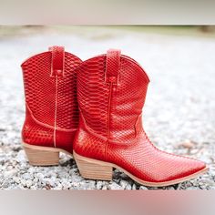 Make A Wild Statement With These Beautifully Crafted Red Snakeskin Cowgirl Boots! Featuring Genuine Leather And A Vibrant Red Shade, These Boots Will Add A Daring Touch Of Sass To Any Outfit. Step Into The Stunning Style Of These Signature Boots Today! Red Leather Boots For Spring, Red Flat Heel Winter Boots, Red Flat Heel Boots For Winter, Spring Boots With Red Sole, Medium Width, Spring Red Boots With Reinforced Heel, Chic Red Faux Leather Boots, Trendy Red Boots With Reinforced Heel, Spring Ankle Boots With Red Sole, Red Round Toe Boots For Fall