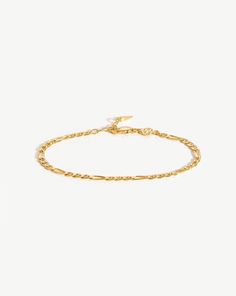 Filia Chain Bracelet | 18ct Gold Plated Vermeil. An Iconic Chain to Wear Your Way. Featuring Retro-Inspired Interlocking Links, this Delicate Bracelet Easily Fastens with a Claw Clasp. Wear as a Pared Back Solo Piece, or Create Contrast with a Chunky T-Bar Chain. Metal: 18Ct Gold Plated Vermeil on Sterling Silver Total Length: 185mm with Extension from 165mm to 185mm Chain Width: 3. 5mm Weight: 2. 9g Product Code: Cr-G-B5-Ns Gold And Silver Bracelets, Monogrammed Items, Retro Inspired, Silver Bracelets, Delicate Bracelet, Jewelry Care, Gold Vermeil, Chain Bracelet, Ring Shopping