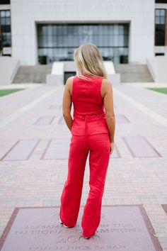 Elevate your style with our Shannon Linen Set in Red! This two piece set includes a sleeveless square neck top with a partial button down front and back tie, paired with high waisted pants. Perfect for a day out, the vibrant red color will make you stand out while the lightweight linen fabric will keep you comfortable. Give your wardrobe a pop of color and sophistication with our Shannon Linen Set! 100% linen inseam: 31.5" Model is 5'6" with a 34" bust, 27" waist, and 36" hips and wearing a smal Red Sleeveless Two-piece Set, Red Wide Leg Summer Sets, Red Wide Leg Sets For Summer, Casual Red Wide Leg Sets, Loungewear Summer, Square Neck Top, Linen Set, Dresses By Length, European Summer