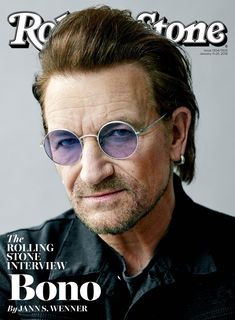 a man wearing sunglasses on the cover of rolling stone magazine