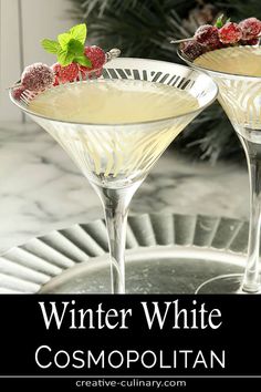 two martinis with raspberries on the rim and text winter white cosmopolian