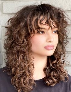 Curly Deva Haircut, Layered Lob Haircut Curly Hair, Cute Haircut Curly Hair, Curly Shag Haircut Fine Hair, Medium Curly Haircuts With Curtain Bangs, Modern Shag Haircut Curly Hair, Shaggy Curly Hair Round Face, Naturally Wavy Hair Updo, Mid Length Wavy Haircuts With Bangs