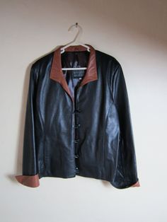 Welcome to my shop. For sale is this fabulous vintage small to medium lambswool and leather women's jacket. The sleeve length is 27 inches and the jacket is in excellent condition. The jacket would fit a woman size 8-10. It looks wonderful when worn and is very classy. Should you buy more than one item I'm also happy to combine the shipping cost. Please have a look at my other items in my shop. BestFrenchBargains Best French bargains does not accept cancellations on any orders so please make sure you are committed  to your purchase before placing a order all returns shipping charges are at the buyers expense and refunds for the original shipping is also at the buyers expense all items must be returned within 14 days in the original packaging and must be sent tracked refunds only given for Fitted Leather Jacket With Buttons For Fall, Vintage Fitted Leather Jacket For Winter, Vintage Leather Fitted Blazer, Vintage Fitted Leather Jacket For Formal Occasions, Retro Leather Jacket For Formal Occasions In Fall, Vintage Formal Fitted Leather Jacket, Leather Jackets Women, Jacket Coat, Women's Jacket