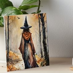 a painting of a witch walking through the woods