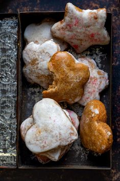 some heart shaped pastries are in a box