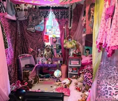 a room filled with lots of pink and purple stuff inside of it's walls