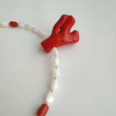 < Mother of Pearl Necklace with red coral pendant > Like 99% of the coral on the market these days, this coral has been dyed. I use bamboo coral which is not endangered or threatened in any way, unlike natural pink or red coral (the production of which is forbidden almost everywhere in the world). Bamboo coral doesn't mean it's not organic. Every bead of it has a distinctive and beautiful coral pattern. My jewelry dyed with high quality paint. It's safe for your health and the paint does n Coral Gemstone Bead Necklace In Red Coral, Red Coral Gemstone Beads Necklace In Coral, Red Coral Hand-strung Necklace As A Gift, Coral Beaded Necklace In Red Coral, Beaded Red Coral Necklaces In Coral Color, Polished Coral Beaded Necklaces, Gift Red Coral Hand-strung Necklace, Coral Beaded Necklaces In Red Coral, Coral Necklace With Natural Red Coral Stones