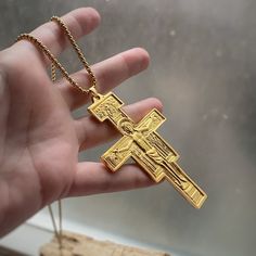 "This is a gold plated pendant depicting Jesus on the cross. It has a long lasting plating and is cast at a production house in Rhode Island, and then hand polished and plated in Toronto, Canada.  It comes with or without the chain - of choosing no chain, you can have it on a bail or a jump ring (see pictures).  measure 9cm x 6cm This piece comes in a lovely unbranded velvet draw string pouch.  Message me with any questions! I respond quickly.  If you would like the pendant on its own choose \"N Gold Metal Crucifix Cross Necklace, Gold Metal Cross Pendant Necklace, Jesus On The Cross, Toronto Canada, The Cross, Rhode Island, Jump Rings, Jewelry Necklace Pendant, Extra Large