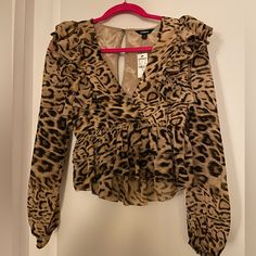 Brand New With Tags Never Worn. Size Xs. Super Cute Just Too Small For Me. Spring Leopard Print Tops With Ruffles, Fall Leopard Print Blouse With Ruffles, Spring Leopard Print Ruffled Blouse, Spring Brown Tiger Print Tops, Red Short Sleeve Blouse, Leopard Print Button-up Top For Work, Leopard Print V-neck Tops For Night Out, Sweetheart Neckline Top, Teal Blouse