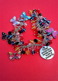 a bracelet with many different charms on it and a tag that says, be brave in the unknown things