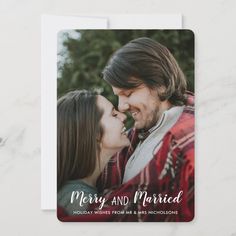 a holiday photo card with the words merry and married on it, in white ink