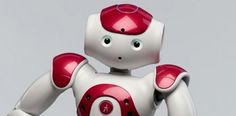 a red and white robot with big eyes