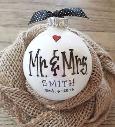 a personalized christmas ornament on burlap