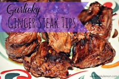 grilled steaks on a colorful plate with text that reads garishy ginger steak tips