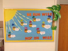 a bulletin board that has been decorated with sun wise and not unwike hats