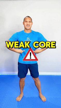 a man standing in front of a sign that says weak core