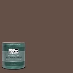 a can of behr paint on a blue background