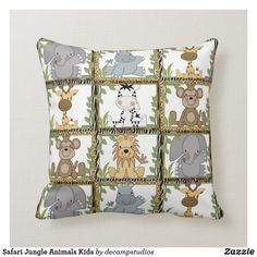 a pillow with animals on it sitting in front of a white wall and the words safari jungle animals kids by decompatiques