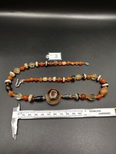 The beautiful mala necklace consist of Himalayan luk Mik or we called them magic eye bead as well in the center of the mala necklace with Banded Agate and carnelian and crystals Luk Mik means (Goat's eyes) in Tibetan Natural found from Himalaya Tibet dating more than 1000 yrs. The origin of this beads from Himalaya Tibet but also can found in India, Nepal and Pakistan too They were used as a special charm Jewelry and amulet at that time period very good condition They were used in prayers mala a Antique Turquoise, Magic Eyes, Carnelian Beads, Mala Necklace, Banded Agate, Time Period, Old Antiques, Agate Beads, Himalayan