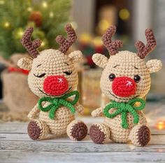 two small crocheted reindeers sitting next to each other