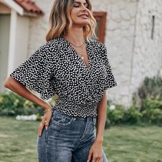 Xs=2 S=4 M=6 L=8/10 Xl=12 Xxl=14 Brand New Ships In 6-10 Days Color: Black And White Style: Boho Pattern Type: Ditsy Floral Type: Top Neckline: V Neck Details: Wrap, Shirred Sleeve Length: Half Sleeve Sleeve Type: Butterfly Sleeve Hem Shaped: Tight Hem Length: Crop Fit Type: Regular Fit Fabric: Non-Stretch Material: Polyester Composition: 97% Polyester, 3% Spandex Care Instructions: Machine Wash, Do Not Dry Clean Sheer: No Casual Black Blouse, Non-stretch Black Short Sleeve Top, Black Non-stretch Tops For Day Out, Non-stretch Black Top For Day Out, Casual Black Blouse For Spring, Black V-neck Summer Blouse, Chic Black Floral Print Tops, Black Tops For Day Out In Spring, Black V-neck Blouse For Spring