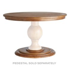 the pedestal table is made from solid wood