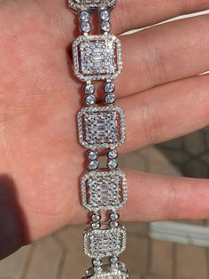 Men's 8.5" long 16mm wide bracelet
***Also available in size 7.5" please leave a message at the CHECKOUT screen where it says "Message to Seller". if you want the 7.5", otherwise we ship 8.5" by default ***
 
Heavy 39 grams.
 
20ct man made diamonds
Gorgeous baguette & round stones 
You can’t tell difference from natural diamonds without a microscope 
Super ICY you have to see to believe!!
 
Solid 925 silver
Not plated or filled...this i Silver Diamond Bracelet With Baguette Diamonds, Luxury Silver Rectangular Tennis Bracelet, Rectangular Cubic Zirconia Bracelets, Silver Rectangular Diamond Bracelet With 17 Jewels, Silver Bracelets With Baguette Diamonds For Anniversary, Rectangular Baguette Diamond Bracelets For Anniversary, Rectangular Jubilee Bracelet In Cubic Zirconia, Elegant Rectangular Iced Out Jewelry, Silver Rectangular Tennis Bracelet For Formal Occasions