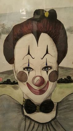 a painting of a clown wearing a bow tie