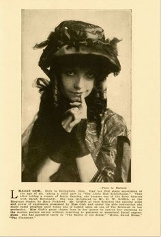 an old black and white photo of a woman wearing a hat with flowers on it