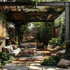 an outdoor living area with lots of plants and furniture