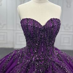 This grandiose a-line ball gown captivates with a dazzling cascade of beading and gems emanating from the fitted waist, while a full, pleated skirt of majestic deep purple spreads extravagantly below. The sleeveless sweetheart bodice, bejeweled in the front and back, is complete with a train and equipped with a lace-up back for effortless adjustments. material: organza color: as shown built in bra sleeveless sweetheart neckline lace up back train full skirt dress shown in size 2 original photos