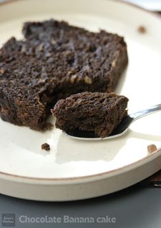 chocolate banana cake on a plate with a spoon