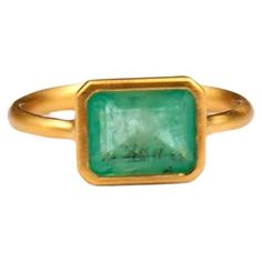 This simple ring by Scrives is composed of an emerald in an rectangular emerald cut. The stone is set in a 22kt closed gold setting. This emerald is natural, not treated and has natural & typical inclusions. This ring is handmade with 22kt mat finish gold. After wearing the jewellery for sometime, the gold will get more shinny. The band shows Scrives stamps. French size: 52.5 US size: 6.25 If you need any size change, we would be happy to do it for free. Follow us on Instagram @scrivesjewelry Green Tourmaline Ring, Contemporary Ring, Simple Ring, Tourmaline Ring, Green Tourmaline, Rings Simple, Dream Jewelry, Cluster Ring, Emerald Cut