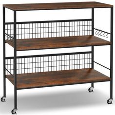 three tiered shelf with wire and wood shelves on casteors, black metal frame