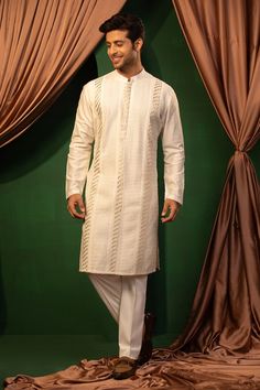 White kurta with hand embroidery and gota dori work. Paired with a plain pant. - Aza Fashions Traditional Fit Cotton Sherwani With Cutdana, Cotton Sherwani With Cutdana In Traditional Fit, Traditional Lawn Suit With Gota Work, Cotton Sherwani With Cutdana For Traditional Ceremonies, Unstitched Traditional Cotton Suit With Gota Work, Traditional Cotton Lawn Suit With Gota Work, Bollywood Style Cotton Sherwani With Gota Work, Traditional Unstitched Cotton Suit With Gota Work, Traditional Cotton Sherwani With Gota Work