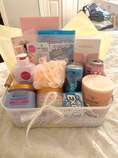 a basket filled with personal care items on a bed