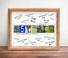 a wooden frame with some writing on it and a red flower in front of it