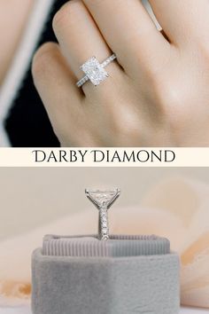 a woman's hand with a diamond ring on it and the words darby diamond