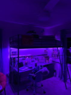 a loft bed is lit up with purple lighting in the bedroom, along with a desk and chair