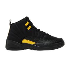 Find JORDAN 12 Retro ' Taxi on Editorialist. The Air Jordan 12 Retro ‘Black Taxi’ delivers a stealthy colorway of Michael Jordan’s championship silhouette. The upper is crafted from black leather, accented with tonal stitched detailing and bolstered with lizard-textured mudguards in color-matched synthetic leather. The monochromatic design is disrupted by contrasting yellow accents, including molded eyelets, a small midfoot overlay, and embroidered Jumpman branding on the tongue. A matching black Phylon midsole packs full-length Zoom Air cushioning for improved responsiveness. Monochromatic Design, Air Jordan 12, Air Jordan 12 Retro, Jordan 12 Retro, Jordan 12, Jordans 12, Yellow Accents, Michael Jordan, Synthetic Leather