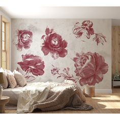 a bedroom with flowers painted on the wall