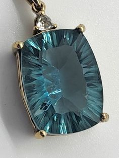 Antique Auqa Blue Topaz, Diamond. Sterling Silver, Gold Plated Brilliant Beautiful Pendant. Very small scuff, age appropriate wear. see photos. M1 Luxury Antique Topaz Jewelry, Orlando Fl, Diamond Pendant, Blue Topaz, Orlando, Favorite Jewelry, Topaz, Silver Gold, Jewelry Necklace Pendant