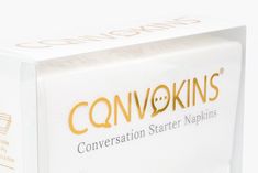 a white box with gold foiling on it that says convokinss conversation starter napkins